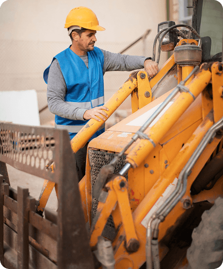 Heavy machinery and worker