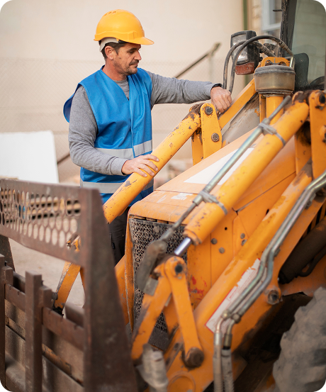 Heavy machinery and worker